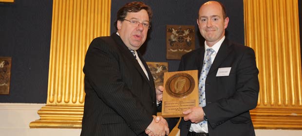 Prof Jonathan Hourihane of Cork University Hospital receives the award for “Communicating Sensitive Information” from An Taoiseach