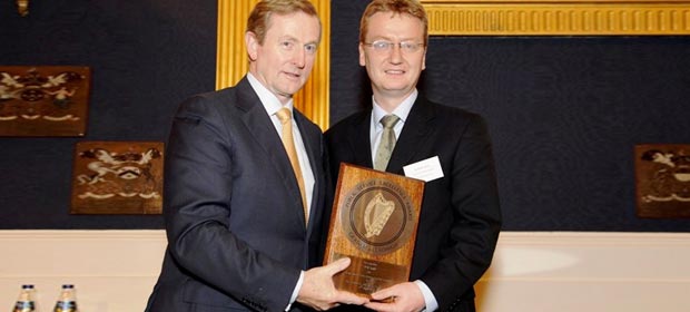 Consultant geriatrician, Dr. Brian Carey receives the award from An Taoiseach, Enda Kenny, T.D.
