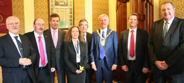 Members of the HMI with the Lord Mayor of Belfast Máirtín O Muilleoir, in the Lord Mayor’s Parlour on April 11, when the Lord Mayor returned especially from Queen Elizabeth’s reception at Windsor Castle to receive the European Association of Hospital Managers delegation.  From left Heinz Kolking, Germany, President EAHM,  Gerry O’Dwyer, HMI and Vice President, EAHM, Adrian Ahern, HMI and EAHM Psychiatric Sub-committee,  Louise McMahon, President, Institute of Healthcare Management, Northern Ireland and EAHM Executive Committee Member, Tom Daly, HMI, Máirtín O Muilleoir, Ard Mhéara Bhéal Feirste, Gerard O’Callaghan, Chief Executive, Victoria South Infirmary, Cork, HMI and Derek Greene, Chief Executive, National Rehabilitation Hospital, Dún Laoghaire, President, HMI