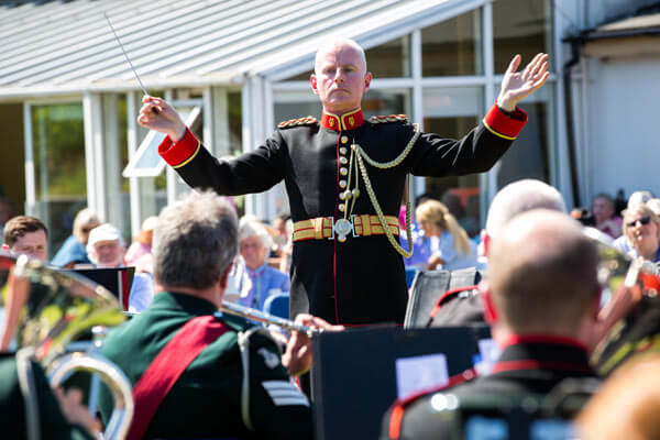 Captain Fergal Carroll, conducts the joint bands of the Army No. 1 Band and Band of the Royal Irish Regiment